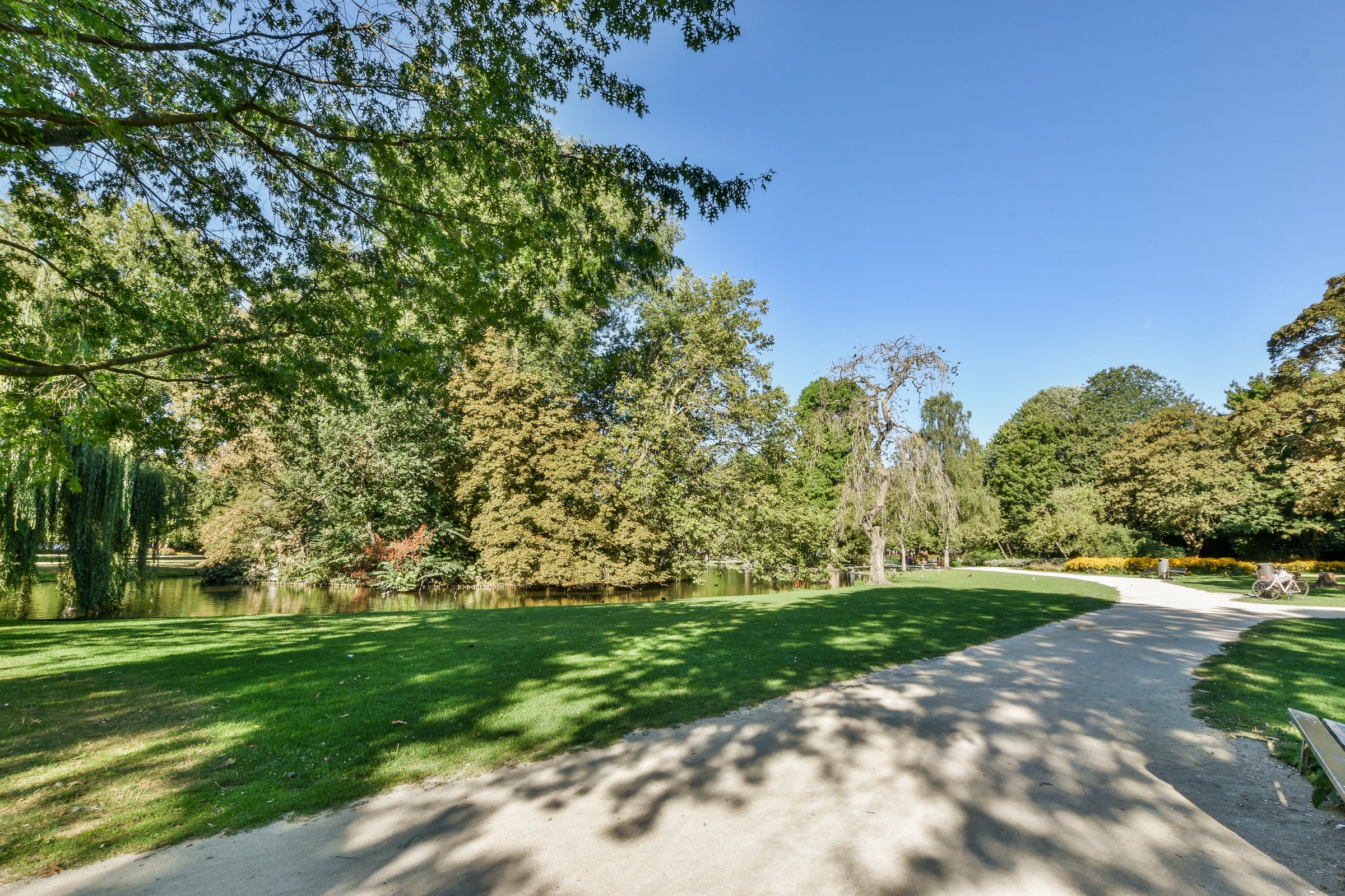 A Path through a Park Next to a Lake